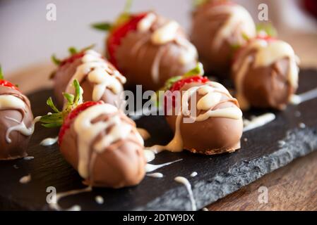 Strawberries with chocolate, delicious and gourmet dessert Stock Photo