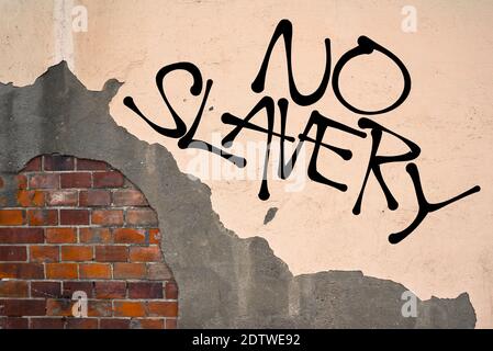 No Child Labour - Handwritten graffiti sprayed on the wall