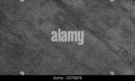 Black textured artificial leather close up. Large grunge texture and background Stock Photo