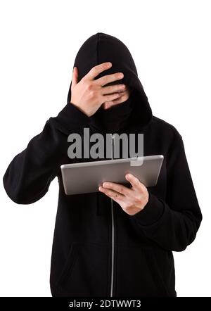 Troubled Hacker with a Tablet Computer on the White Background Stock Photo
