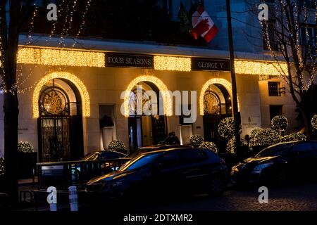 George V Hotel with Christmas lights on avenue George V - Paris, France Stock Photo