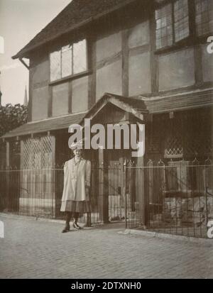 Antique c1900 photograph, tourist at Shakespeare's Birthplace in Stratford-upon-Avon, England. Shakespeare's Birthplace is a restored 16th-century half-timbered house situated in Henley Street, where it is believed that William Shakespeare was born in 1564 and spent his childhood years. SOURCE: ORIGINAL PHOTOGRAPH Stock Photo