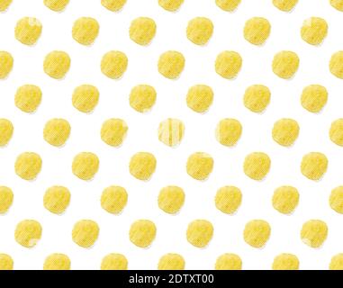 Seamless pattern made from Potato chips on white background flat lay. potato snack chips isolated Fast food banner. Stock Photo