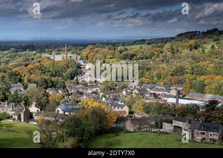 Clarence Mill, Bollington and distant city of Manchester in autmn, Bollington, Cheshire, England, UK Stock Photo