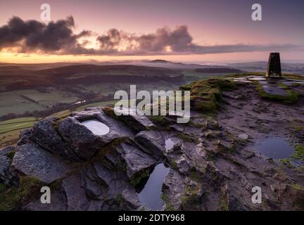 Dawn from the peak of Shutlingsloe over Wildboarclough, near Macclesfield, Cheshire, Peak District National Park, England, UK Stock Photo