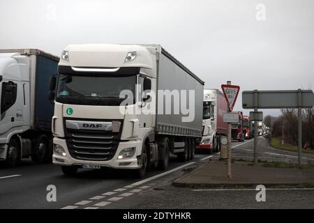 Kent, UK. 22nd Dec, 2020. Hundreds of lorries park up on one of the main roads to Dover Port in Kent as France bans travel to its mainland while a new strain of Coronavirus has been discovered in the UK on Tuesday, December 22, 2020. The UK are waiting for the French Government to approve travel again so the Lorries can carry on their journey. Photo by Hugo Philpott/UPI Credit: UPI/Alamy Live News Stock Photo