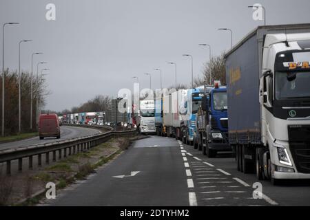 Kent, UK. 22nd Dec, 2020. Hundreds of lorries park up on one of the main roads to Dover Port in Kent as France bans travel to its mainland while a new strain of Coronavirus has been discovered in the UK on Tuesday, December 22, 2020. The UK are waiting for the French Government to approve travel again so the Lorries can carry on their journey. Photo by Hugo Philpott/UPI Credit: UPI/Alamy Live News Stock Photo