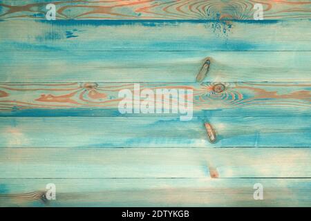 Old painted green wooden board background. Vintage turquoise wood planks texture. Aged painted textured wood wall. Front view with copy space. Stock Photo