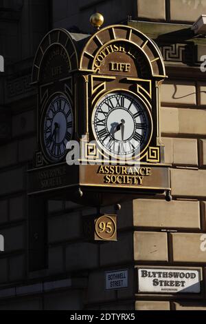 Decorative four faced clock of the Scottish legal Life Assurance Society in Glasgow, Scotland, UK, Europe Stock Photo