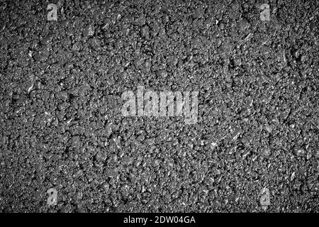 Gray new asphalt texture. Bright and panoramic image of road background. Tar detail. Graphic resource Stock Photo
