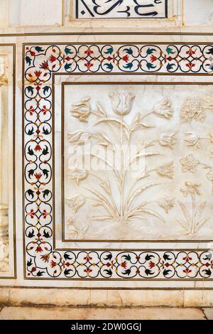 Arabic writing detail on a tombstone in a historic graveyard- the ...