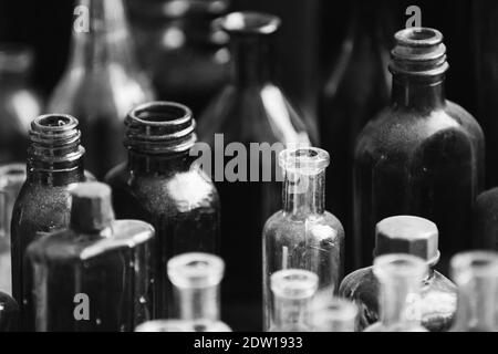 Many Old Deutsch Vintage Medical Glass Capacity. Detail Of Retro Chemical Pharmaceutical Science Researches. Small Bottles Different Sizes From Times Stock Photo