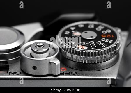 Shutter speed dial, shutter release button and film wind lever of old camera Stock Photo