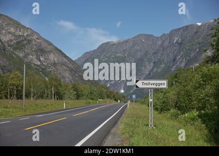 Road sign showing directions to famous tourist destination Troll Wall in Trollveggen in Norway. Stock Photo
