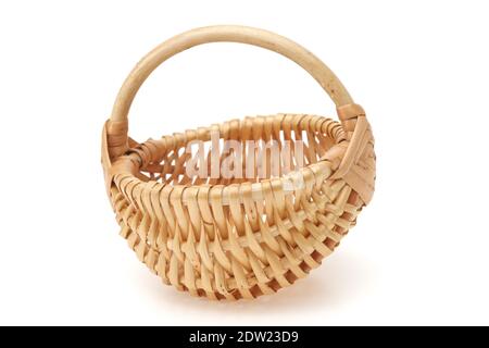 Small rustic basket, isolated on white. Stock Photo