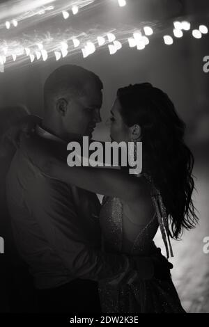 Newlyweds dancing their first dance at the wedding. Dancing bride and groom. Wedding party Stock Photo