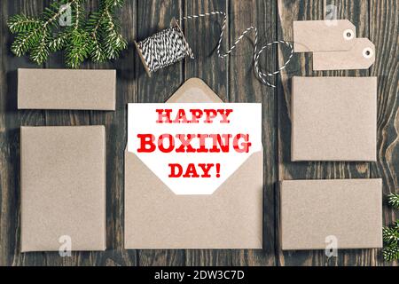 Happy Boxing Day! Gift boxes on wooden background Stock Photo