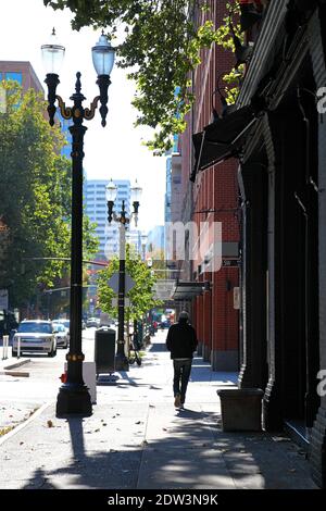 Man walking in City Stock Photo