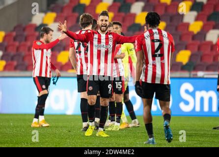 Brentford, UK. 22nd Dec, 2020. Brentford players celebrating after the Carabao Cup Quarter Final match between Brentford and Newcastle United at the Brentford Community Stadium, Brentford, England on 22 December 2020. Photo by Andrew Aleksiejczuk/PRiME Media Images. Credit: PRiME Media Images/Alamy Live News Stock Photo