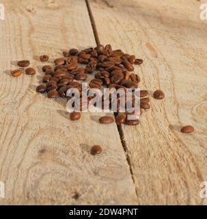roasted coffee beans on wood Stock Photo