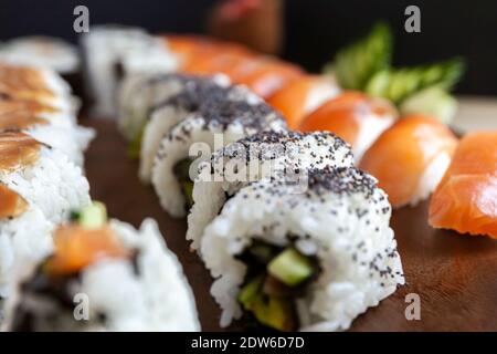 Set of sushi rolls deliciously laid out on a platter
