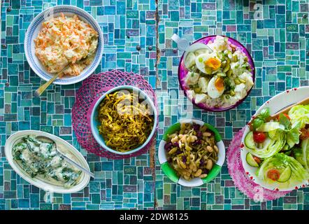 Coleslaw, Curried Cabbage, Potato Salad, (Wild spinach) Morogo, Green Salad, Bean salad Stock Photo