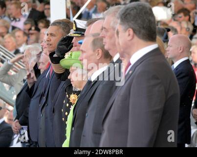 L-R : President of the United States, Barack Obama, British Queen Elizabeth II, President of Russia, Vladimir Putin, Czech President Milos Zeman attend the International Ceremony at Sword Beach in Ouistreham, as part of the official ceremonies on the occasion of the D-Day 70th Anniversary, on June 6, 2014 in Normandy, France. Photo by Abd Rabbo-Bernard-Gouhier-Mousse/ABACAPRESS.COM Stock Photo