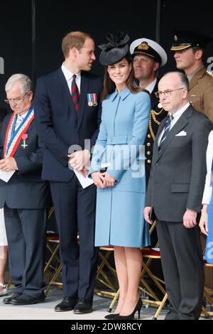 Duke and Duchess of Cambridge attend the Commemoration of the D-Day 70th Anniversary, on June 6, 2014 in Arromanches, Normandy, France. She wears a coat of Alexander McQueen. Photo by Abd Rabbo-Bernard-Gouhier-Mousse/ABACAPRESS.COM Stock Photo