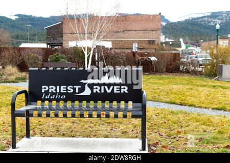The Priest River Idaho welcome sign and logo on the back of a bench in a small park in Priest River, Idaho USA. Stock Photo