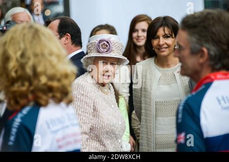 Queen Elizabeth II visits Paris Flower Market on June 7, 2014 in Paris, France. The Queen is on the final day of a three day State Visit to Paris. The Flower Market was named 'Marche Aux Fleurs Reine Elizabeth II' in the Queen's Honour today. Photo by Ammar Abd Rabbo/ABACAPRESS.COM Stock Photo