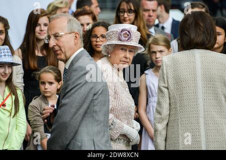 Queen Elizabeth II visits Paris Flower Market on June 7, 2014 in Paris, France. The Queen is on the final day of a three day State Visit to Paris. The Flower Market was named 'Marche Aux Fleurs Reine Elizabeth II' in the Queen's Honour today. Photo by Ammar Abd Rabbo/ABACAPRESS.COM Stock Photo