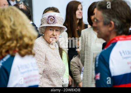 Queen Elizabeth II visits Paris Flower Market on June 7, 2014 in Paris, France. The Queen is on the final day of a three day State Visit to Paris. The Flower Market was named 'Marche Aux Fleurs Reine Elizabeth II' in the Queen's Honour today. Photo by Ammar Abd Rabbo/ABACAPRESS.COM Stock Photo