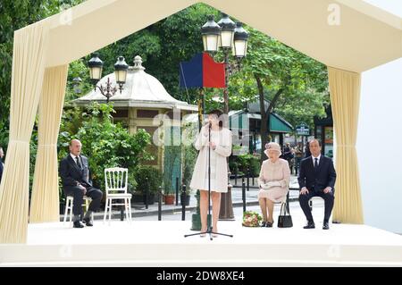 Anne Hidalgo Mayor of Paris (L) and Francois Hollande President of France flank Queen Elizabeth II as she unveils a sign renaming Paris Flower Market on June 7, 2014 in Paris, France. The Queen is on the final day of a three day State Visit to Paris. The Flower Market was renamed 'Marche Aux Fleurs Reine Elizabeth II' in the Queen's Honour today. Photo by Ammar Abd Rabbo/ABACAPRESS.COM Stock Photo