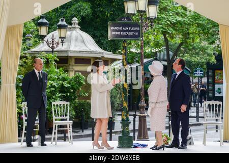 Anne Hidalgo Mayor of Paris (L) and Francois Hollande President of France flank Queen Elizabeth II as she unveils a sign renaming Paris Flower Market on June 7, 2014 in Paris, France. The Queen is on the final day of a three day State Visit to Paris. The Flower Market was renamed 'Marche Aux Fleurs Reine Elizabeth II' in the Queen's Honour today. Photo by Ammar Abd Rabbo/ABACAPRESS.COM Stock Photo