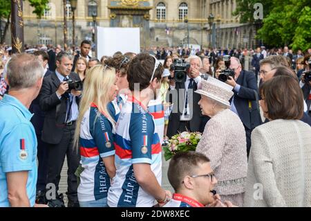 Queen Elizabeth II visits Paris Flower Market on June 7, 2014 in Paris, France. The Queen is on the final day of a three day State Visit to Paris. The Flower Market was named 'Marche Aux Fleurs Reine Elizabeth II' in the Queen's Honour today. Photo by Ammar Abd Rabbo/ABACAPRESS.COM Stock Photo