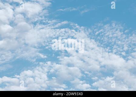 light summer cirrus clouds in blue sky Stock Photo