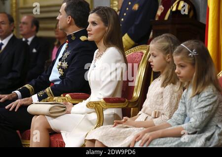 King Felipe VI of Spain, Queen Letizia of Spain and daughters Princess Sofia and Princess Leonor, Princess of Asturias at the Congress of Deputies during the Kings first speech to make his proclamation as King of Spain to the Spanish Parliament on June 19, 2014 in Madrid, Spain. The coronation of King Felipe VI is held in Madrid. His father, the former King Juan Carlos of Spain abdicated on June 2nd after a 39 year reign. The new King is joined by his wife Queen Letizia of Spain. Stock Photo