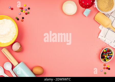 Baking or cooking background frame. Ingredients, kitchen items for baking. Kitchen utensils, flour, eggs, sugar. Text space, top view Stock Photo