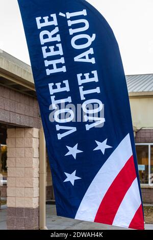 Vote Here banner (in English and Spanish) at Lenora Park in Metro Atlanta's Gwinnett County during in-person early voting on December 22, 2020, for the United States Senate special election runoff for both of Georgia's U.S. Senate seats. (USA) Stock Photo