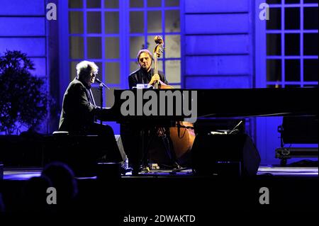 French musician and composer Michel Legrand performs live on stage at the Imperial Palace of Compiegne during the third 'Palais en Jazz' Festival, on June 28, 2014 in Compiegne, France. Photo by Edouard Bernaux/ABACAPRESS.COM Stock Photo