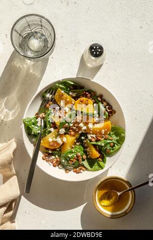 Golden beet salad with green lentil,feta cheese and spinach in a bowl