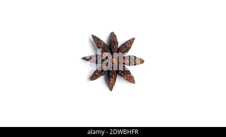 Cinnamon, dried oranges, star anise and cloves on a white background.  Stock Photo