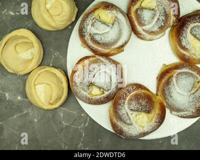 Delicious buns made from yeast dough. Fresh baked goods made by hand at home Stock Photo