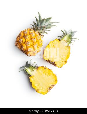 Ripe baby pineapple. Halved mini pineapple  isolated on a white background. Stock Photo