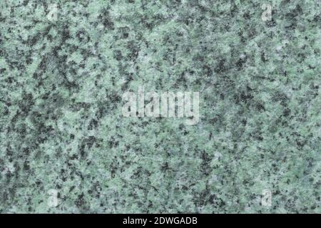 Abstract art background black and green color. Texture of stone tabletop and countertop with blotches, backdrop. Decorative wallpaper. Stock Photo