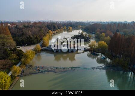 Tourists visit the Slender West Lake scenic area in Yangzhou, east ...