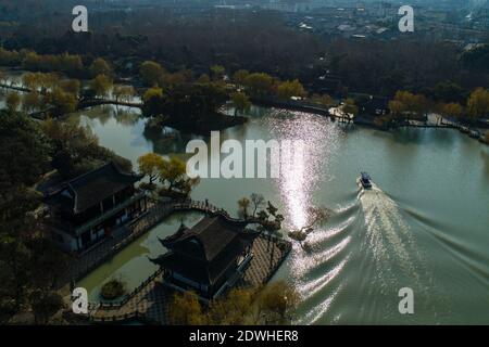 Tourists visit the Slender West Lake scenic area in Yangzhou, east ...