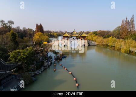 Tourists visit the Slender West Lake scenic area in Yangzhou, east ...