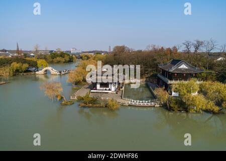 Tourists visit the Slender West Lake scenic area during sunset in ...