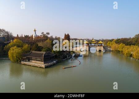 Tourists visit the Slender West Lake scenic area in Yangzhou, east ...
